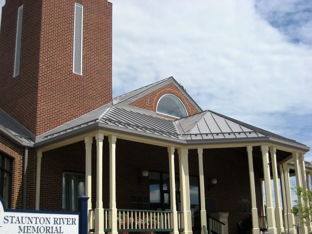 Skilled roofing craftsmen working on a residential roof in Downtown Youngstown